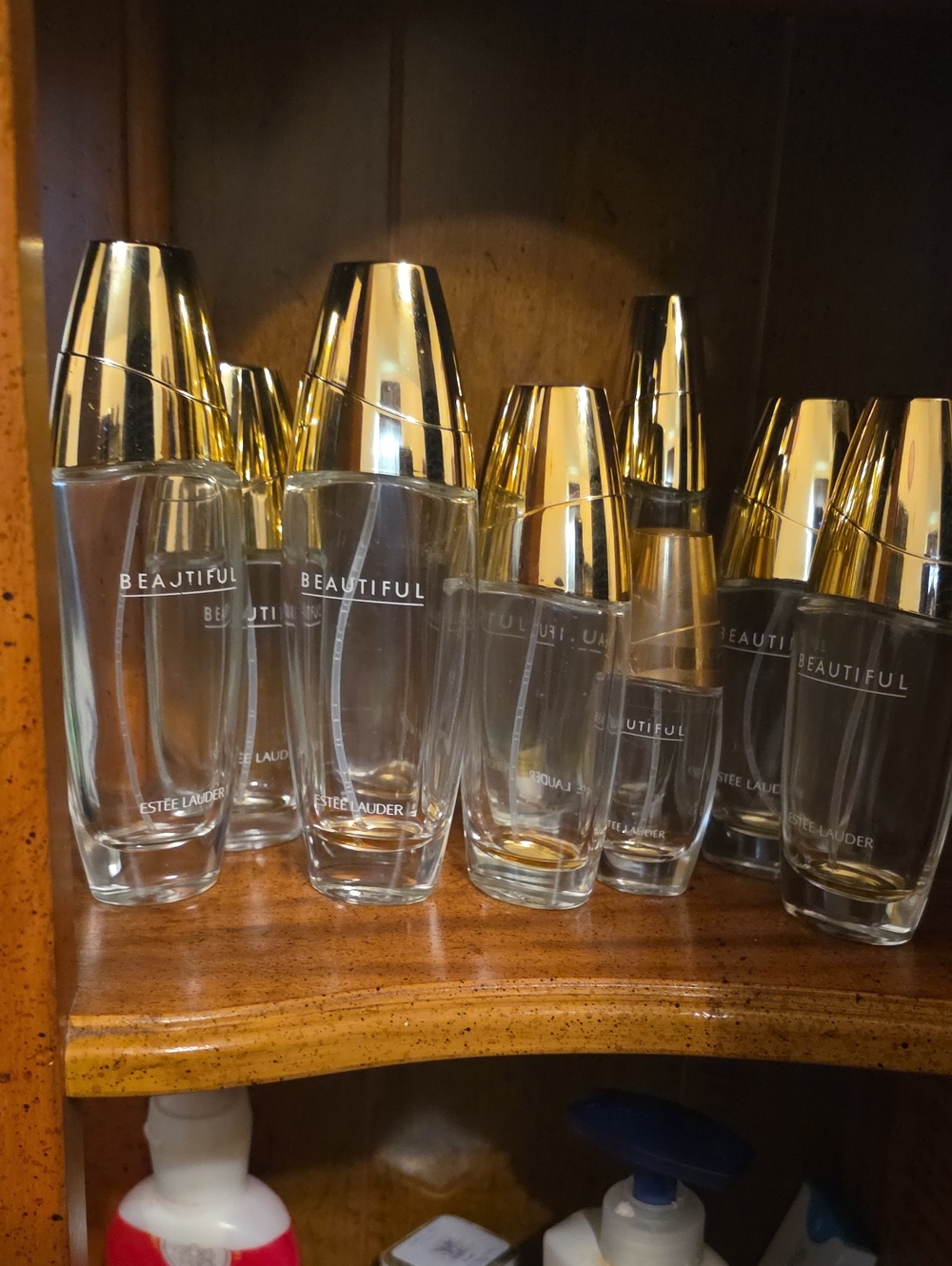 Estee Lauder Clear Glass Vanity Bottles with Gold Caps 10 emty Bottles